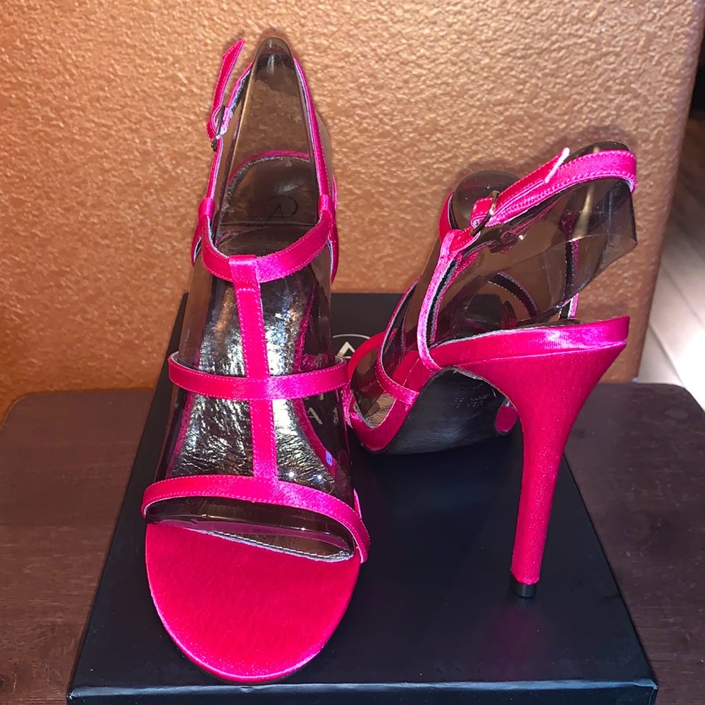 Bright pink satin heels; like a Barbie shoe